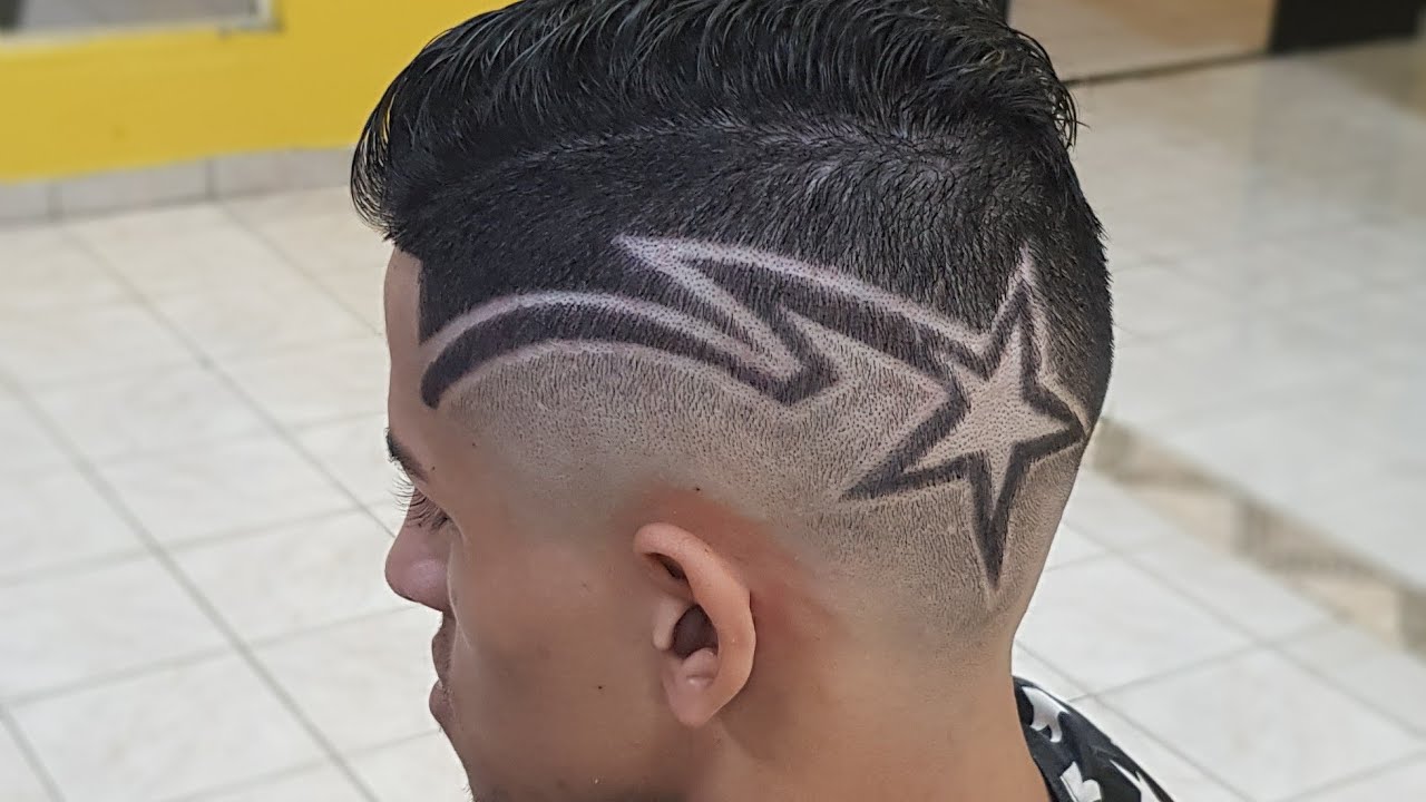 corte de cabelo masculino com desenho de estrela