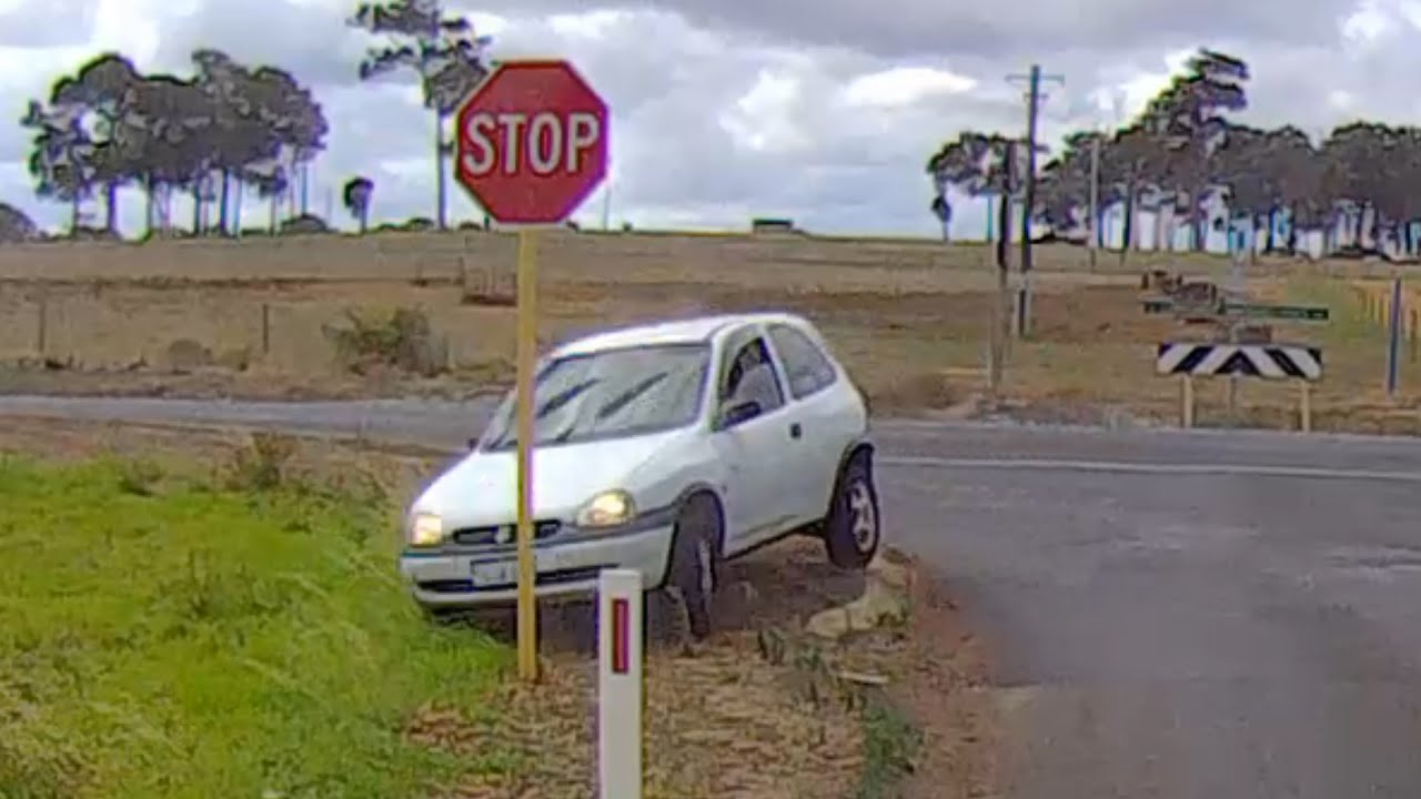 Distracted Driver Crashes into Stop Sign YouTube
