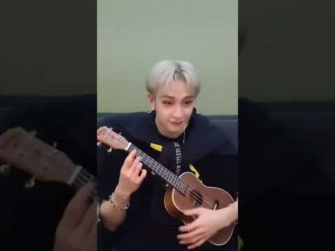 Chan tuning the ukelele