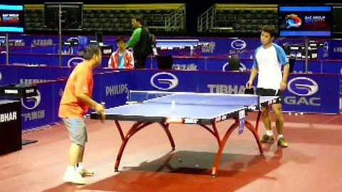 WTTC 2011 Rotterdam: Wang Hao warmup with Liu Guol...