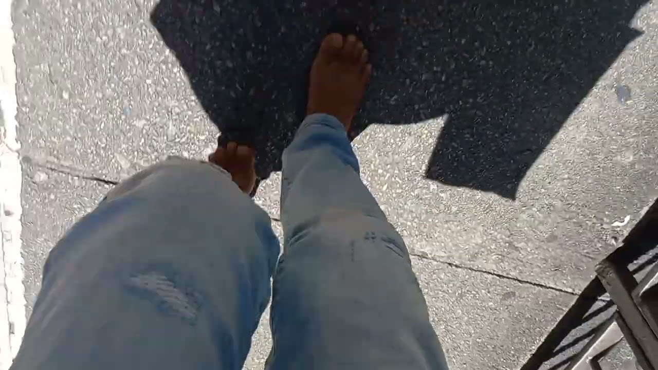 Running Barefoot on a hot road 