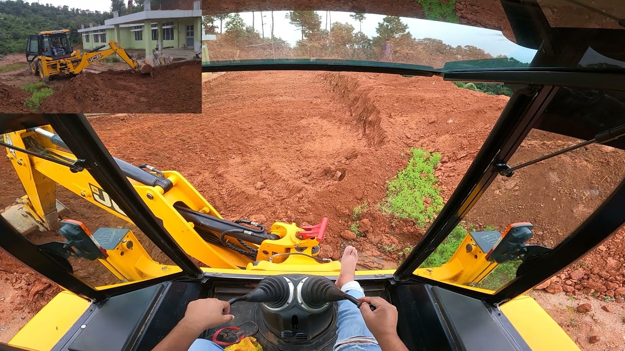 jcb working in a building compound inside view
