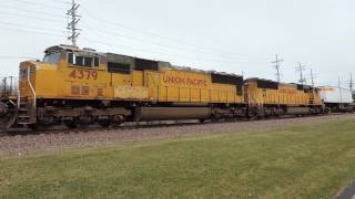 UP 8869 a SD70AH leads a westbound bird with 2 SD70M's in Geneva