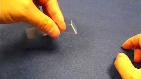 Stress whitening  of write-on transparency in bending and removal