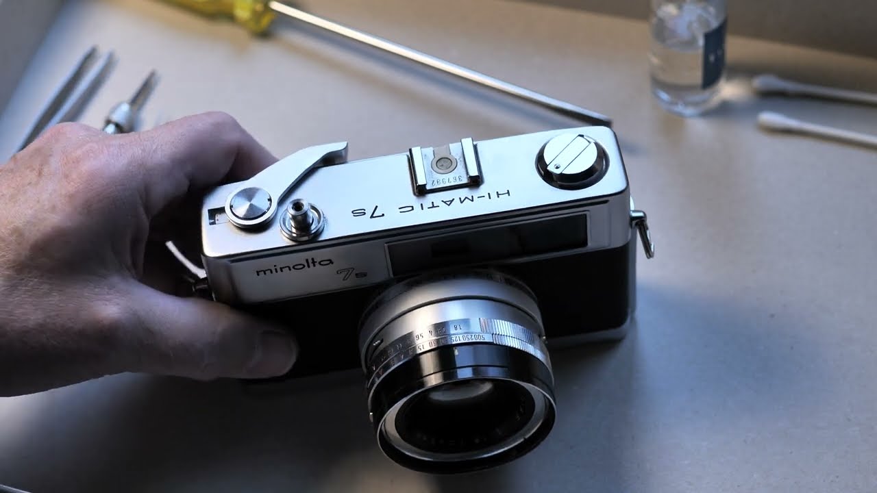 Minolta HiMatic 7S top cover removal - YouTube