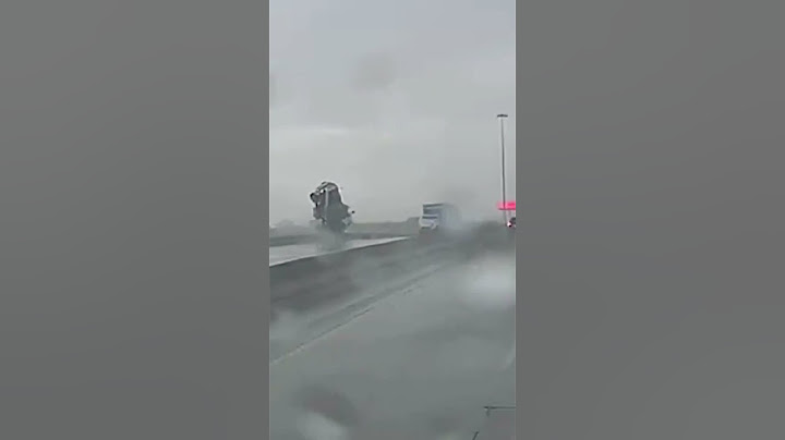 Driver Jumps From 18-Wheeler As It Goes Off Overpass After Hydroplaning In Houston