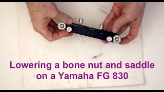 Reducing a bone nut and saddle for a Yamaha FG836 acoustic guitar. This is one way to do it.