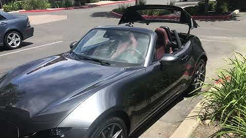 Mazda MX-5 RF opening, closing roof with a key fob.