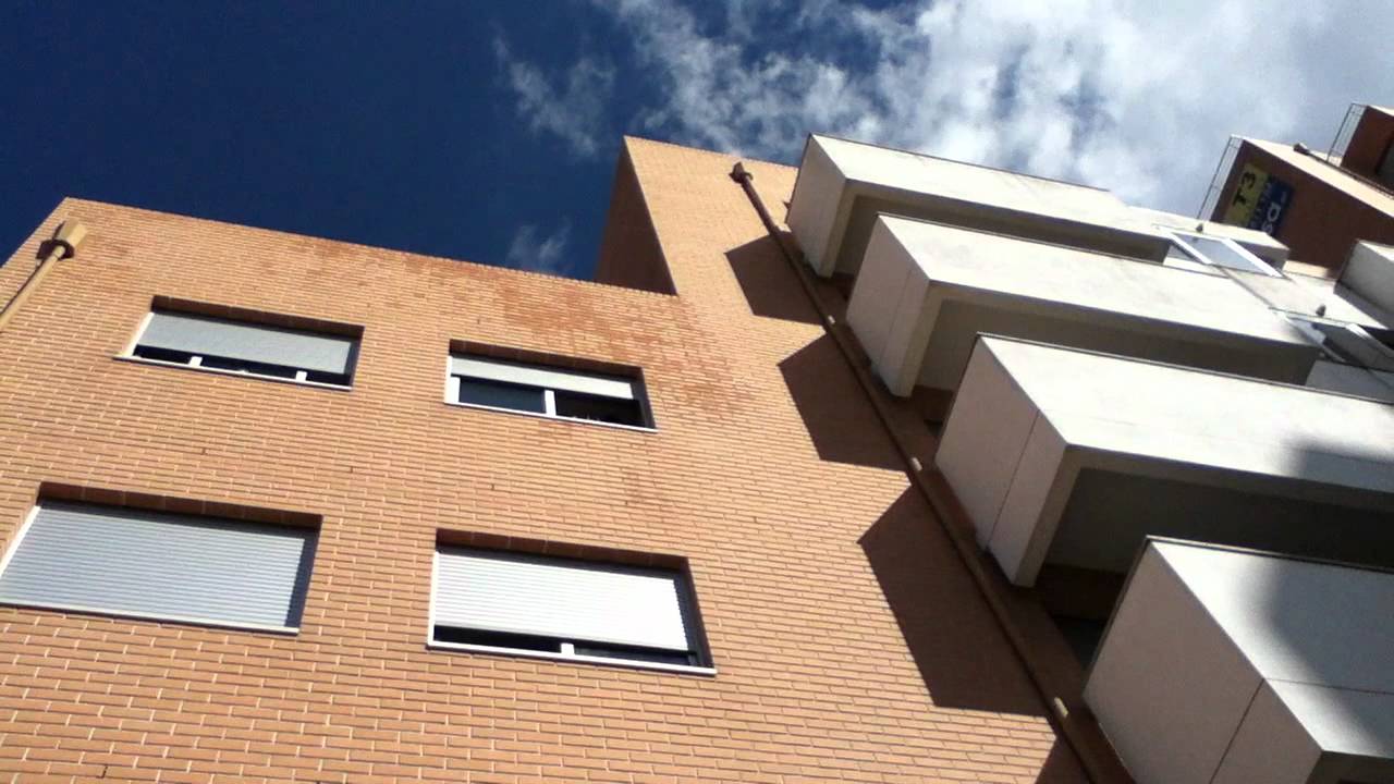 Base jump through building a house Base jump through building a house