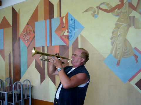Arturo Sandoval spends Russian trumpeter Anatoly Sizonov.