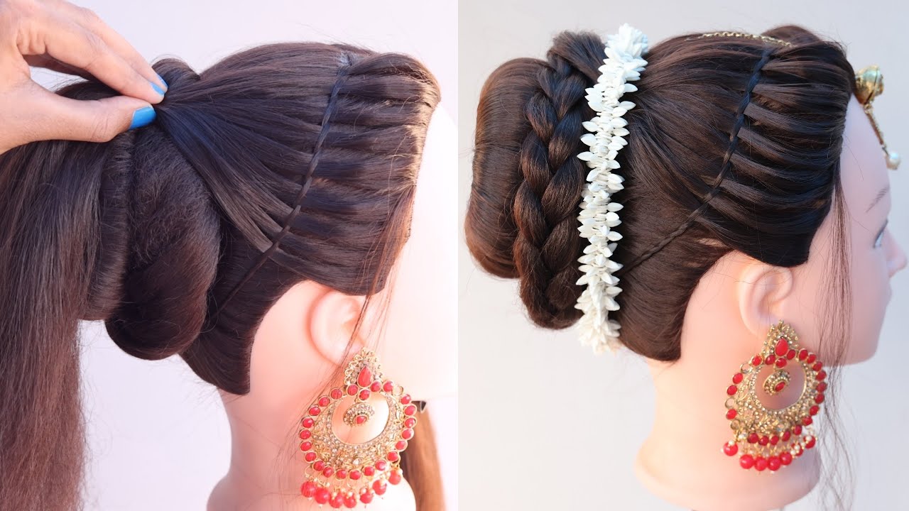 latest bun hairstyle for wedding guest with gajra