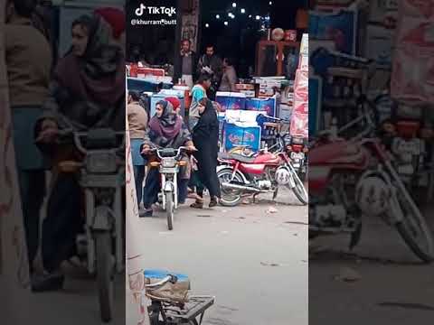 A local girl drive Bike in Karachi