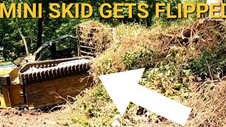 ground cover removal in woods: mini-skid steer gets flipped on its side!