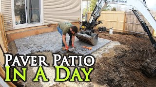 installing a paver patio with an excavator