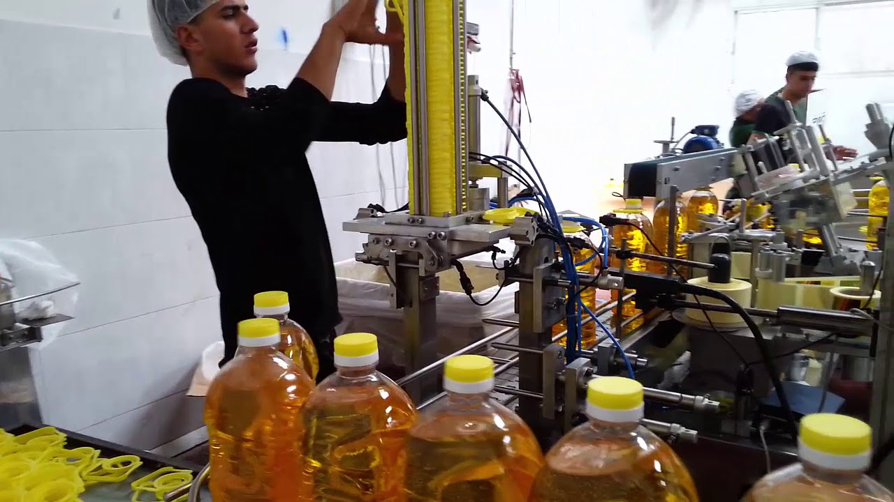 خط تعبئة الزيت 12 عبوة Oil Filling Line 12 sets