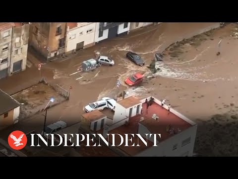 Spain floods: Cars washed away by torrential rain in aerial footage