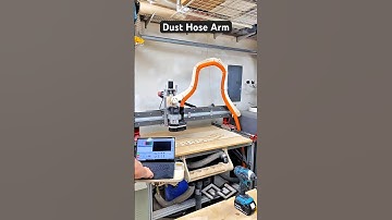 Crazy design to hold our dust collection hose on our CNC. #cnc #cncmachine #dustcollection