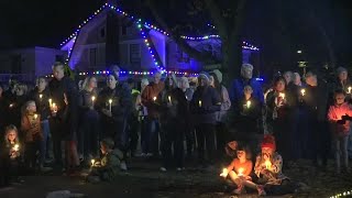 The community holds a candlelight vigil in honor of Mora Gerety