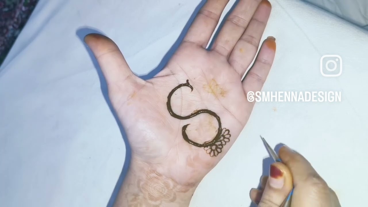 S letter design with mehendi 