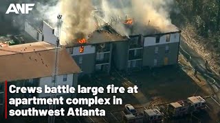 Crews battle large fire at apartment complex in southwest Atlanta