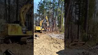 How to take a tree down with an excavator. by John Buelow Excavating 24 views 3 years ago 1 minute, 32 seconds