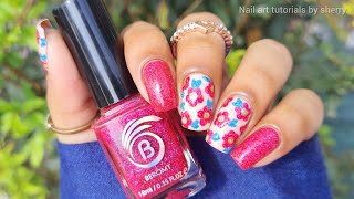 Easy and cute floral nail art with toothpick