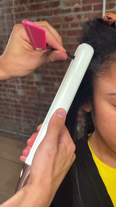 Cara meluruskan rambut keriting dengan catok rambut