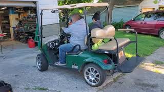 Golf cart with Resilient Sounds audio system.