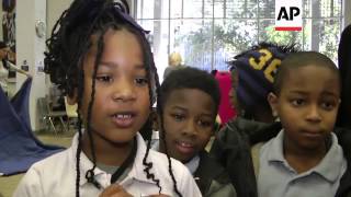 New Orleans musicians played as TV actor Wendell Pierce read to about 500 elementary school students Information