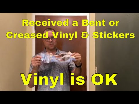 Received a Bent or Creased Vinyl & Stickers. Vinyl is ok.