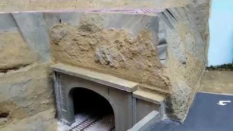 HO Scale Model Railroad using Sculptamold on Foam Board as a Mountain Face.