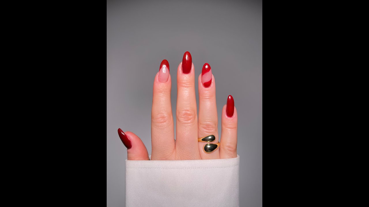 Radiant Red Swirl Nail Design