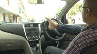 Man with No Arms Learns to Drive with Feet