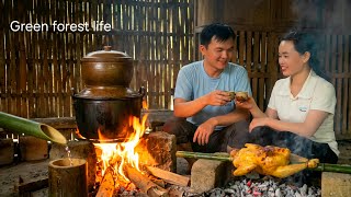 Robert and Mai distill banana wine using traditional methods. Green forest life 