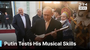 Unexpected Moment: Putin Tries His Hand at the Kyrgyz Komuz During State Visit | DRM News | AC1F