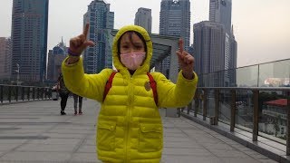8-Year-Old Girl Scales Shanghai Tower (World's 2nd Tallest Skysraper)