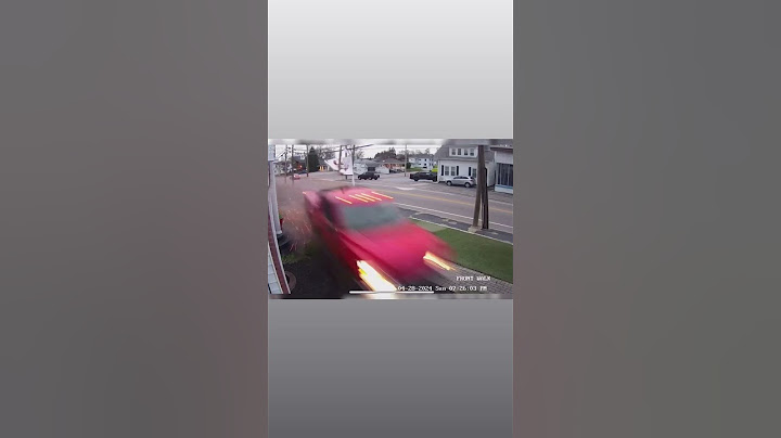 Truck Narrowly Misses Ice Cream Shop and Parked Cars During Crash | VIDEO