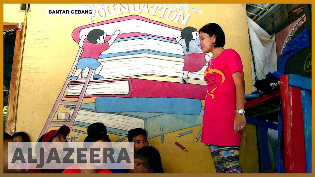 إندونيسيا: أطفال جامعي النفايات يتعلمون أن يحلموا أحلاماً كبيرة | الجزيرة الإنجليزية