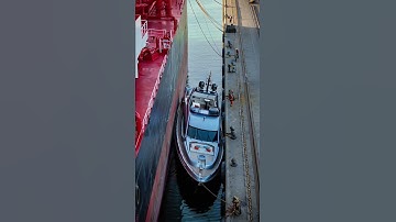 In the port, a huge tanker docking at the pier didn’t notice a nearby yacht