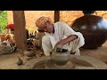 Potter at work makes ceramic dishes 6 india