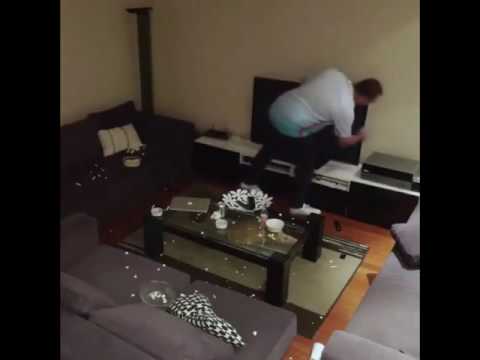 wife-plays-a-prank-on-football-mad-husband,-by-switching-the-tv-off