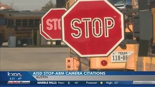 AISD ticketing drivers illegally passing school buses