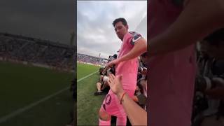About To Take A Corner Still Shaking Hands With The Fans. Thats Messi.