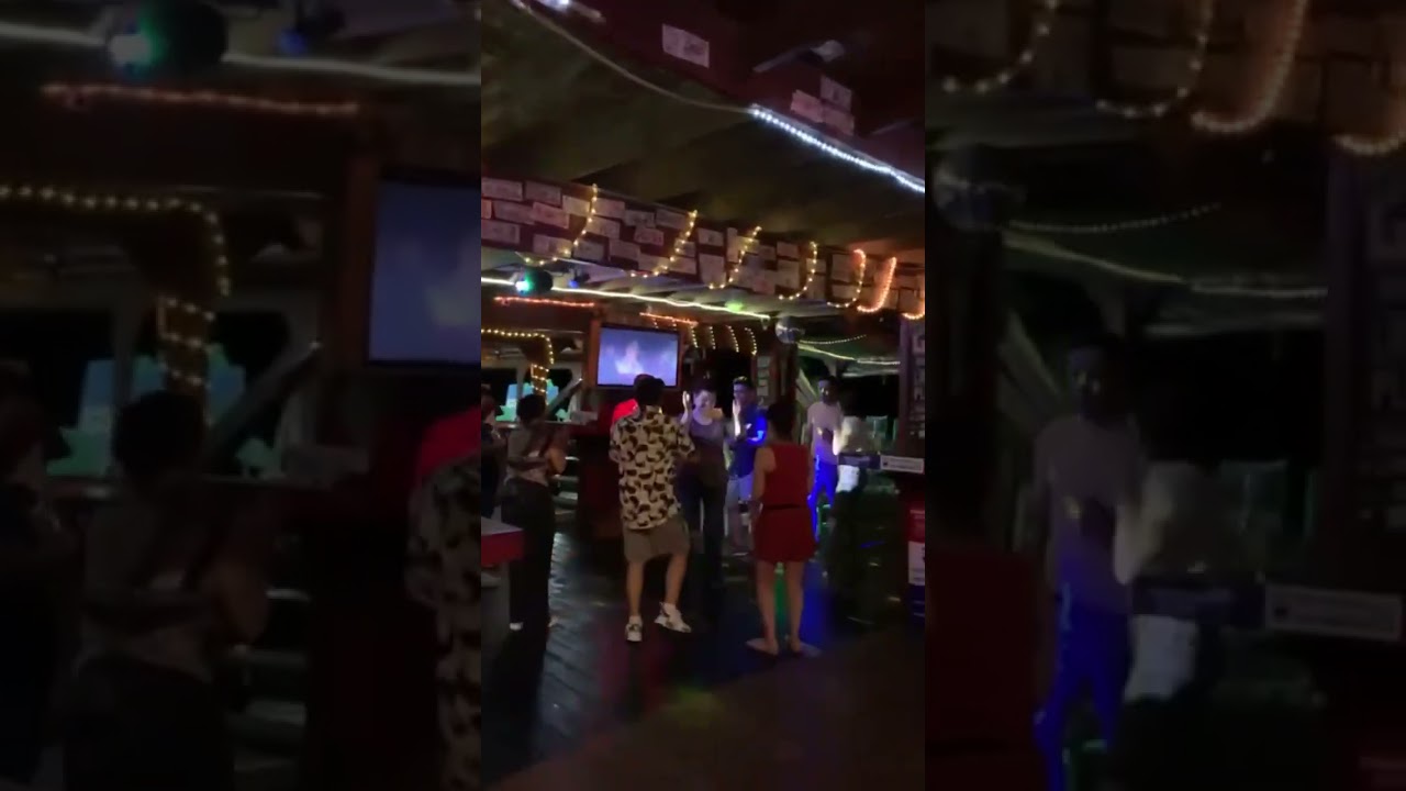 Crazy Caribbean dance party Happy Harry’s restaurant bar over the water West End Roatan