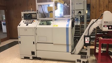 Hardinge Fanuc Robot load Quest 27SP Gang Tool CNC Lathe with Fanuc 21iTB CNC Control 230 volt