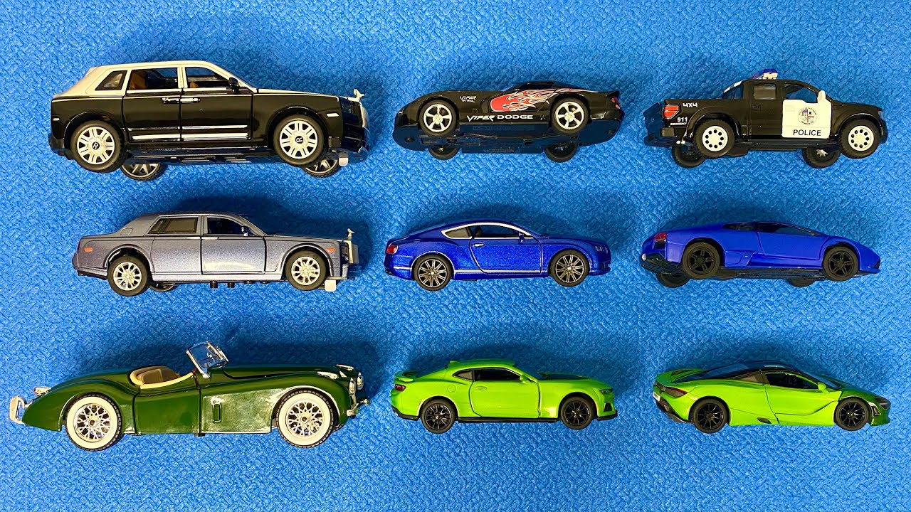 Different Scale Diecast Model Cars being Review in Hands YouTube