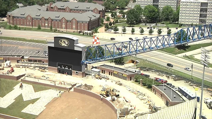 Mike Alden climbs Faurot Construction Crane