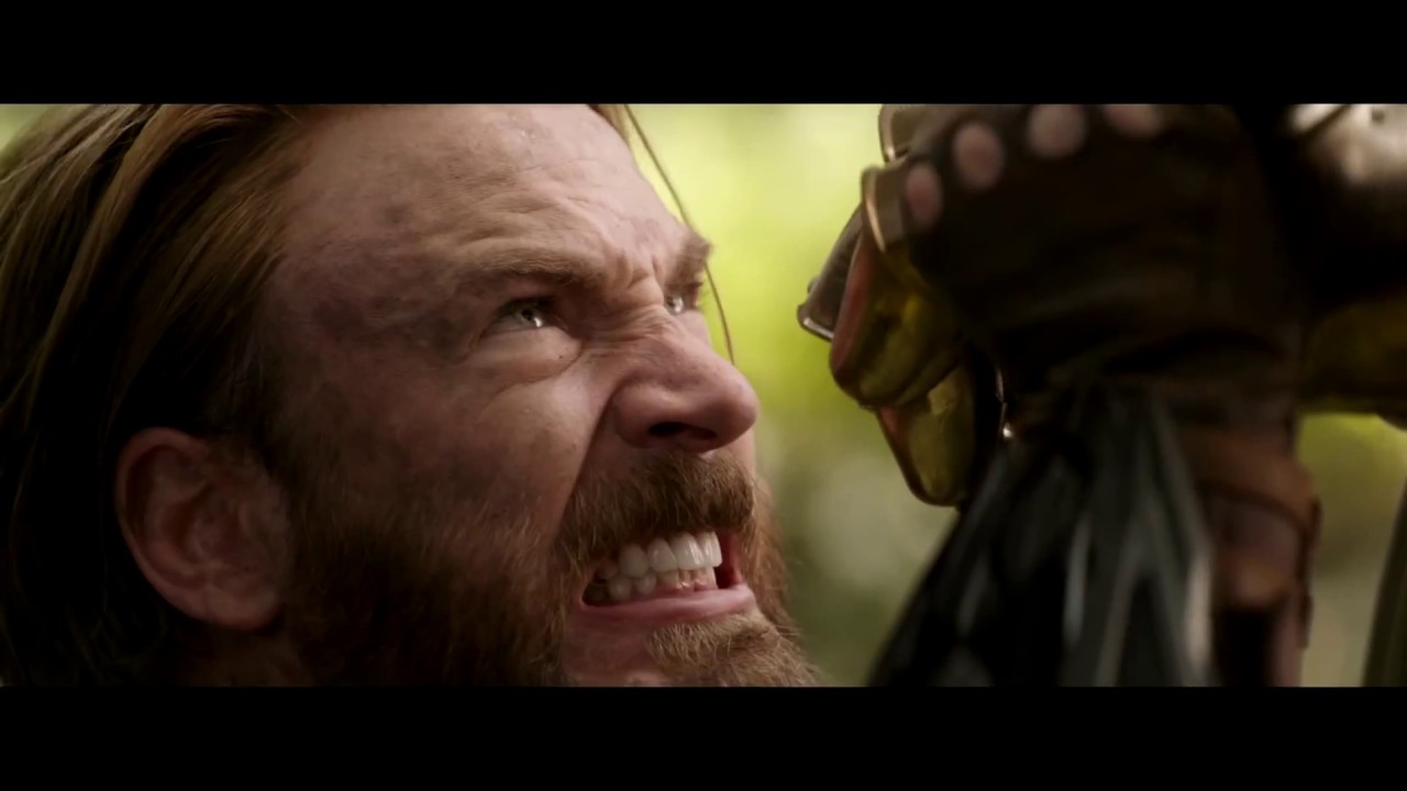 Captain America holding off Thanos!
