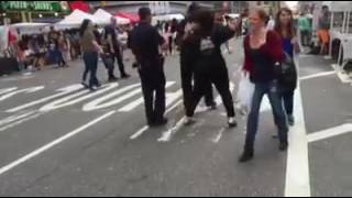 NYPD officer doing Cupid Shuffle