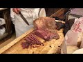 Making katzs deli pastrami and corned beef sandwich  the king of all sandwiches in the world